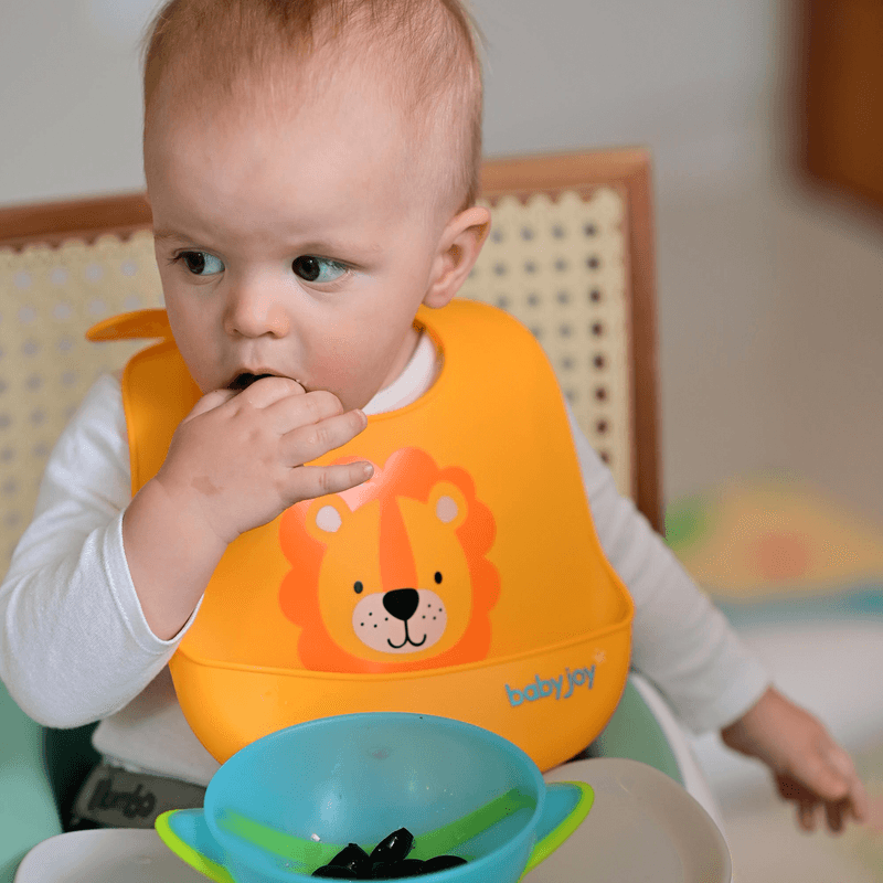 15036_519-babador-de-silicone-pega-migalhas-leao-amarelo-baby-joy